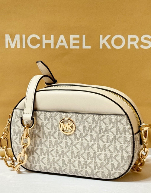 Load image into Gallery viewer, MICHAEL KORS JET SET GLAM SMALL FRONT POCKET OVAL CROSSBODY BAG MK LIGHT CREAM
